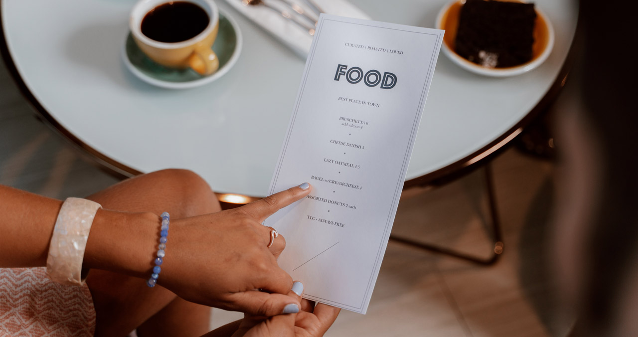 Printed brand materials created by DesignUnic